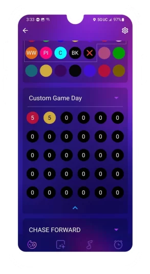 A smartphone screen shows a colorful user interface for customizing a game. Colored circles with initials are at the top, followed by a Custom Game Day section with a grid of circles, some labeled 5 and others 0. {{brizy_dc_image_alt imageSrc=